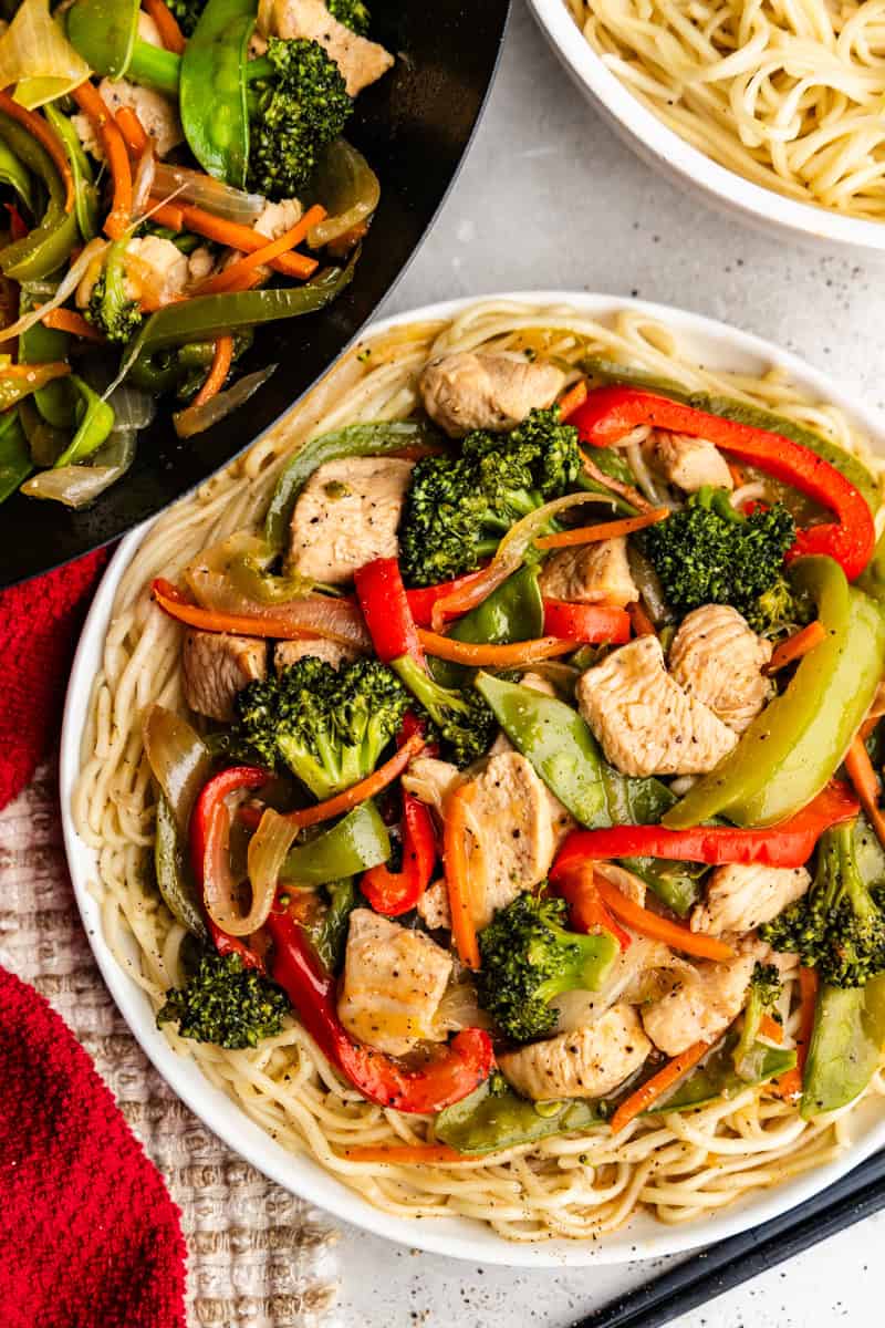 Overhead or take-out chicken stir fry on a plate.
