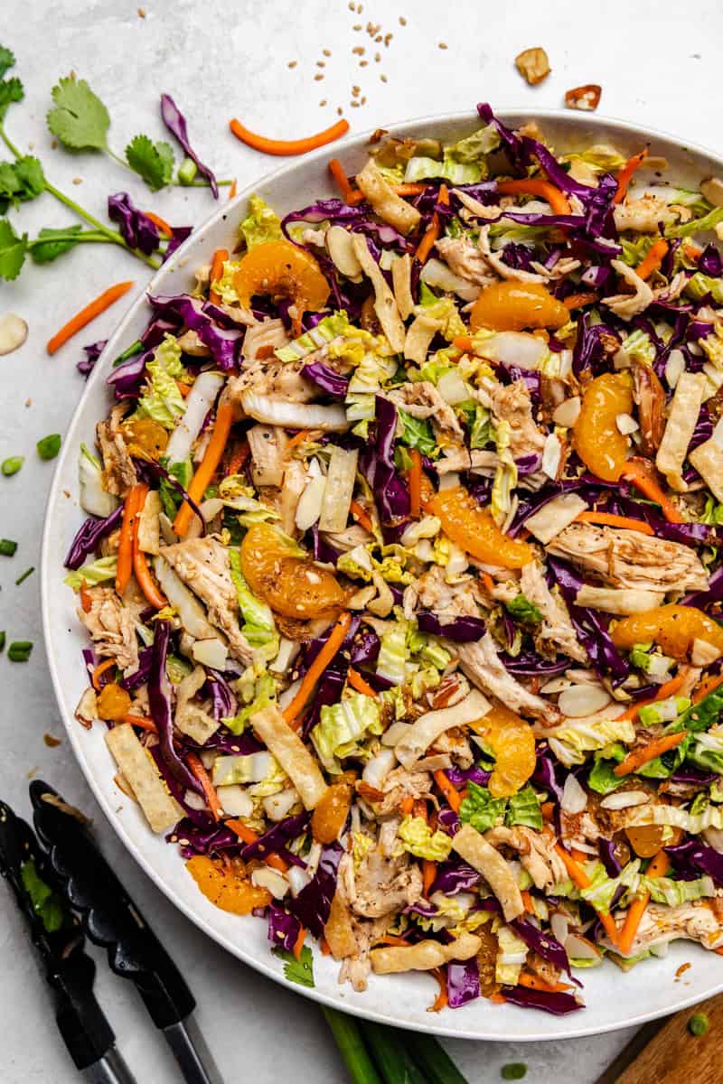 Chinese chicken salad mixed in a large bowl.