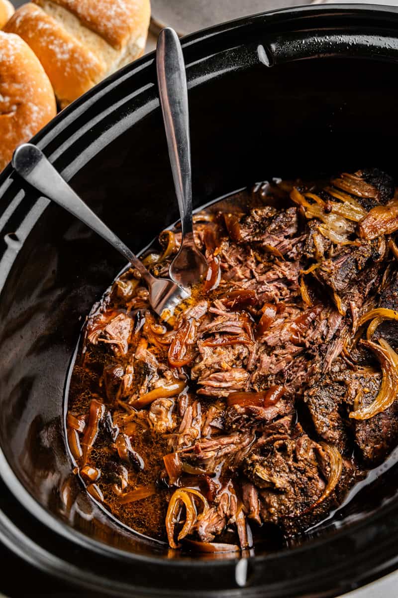Closeup of a Shredded Beef in a slow cooker.