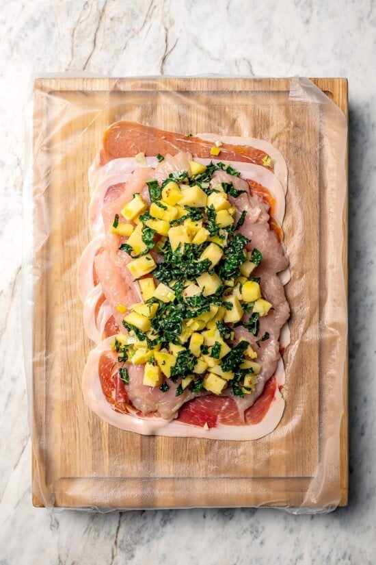 Kale and apple filling on turkey tenderloin.
