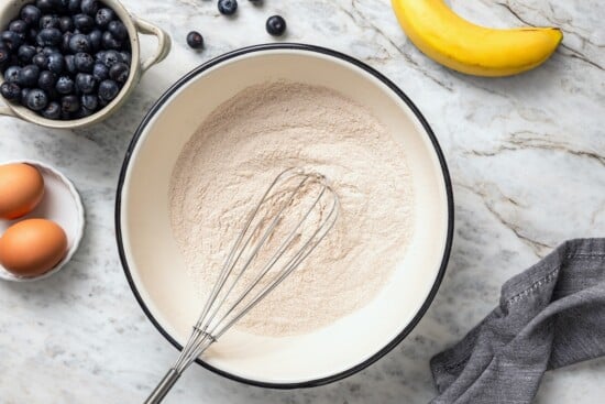 Whisk in bowl with dry ingredients.