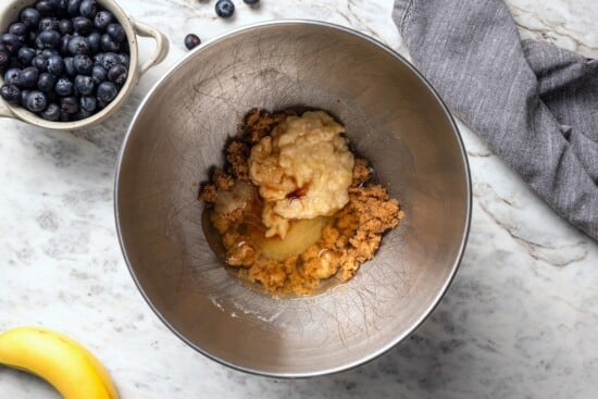 Wet ingredients for blueberry banana bread in bowl.
