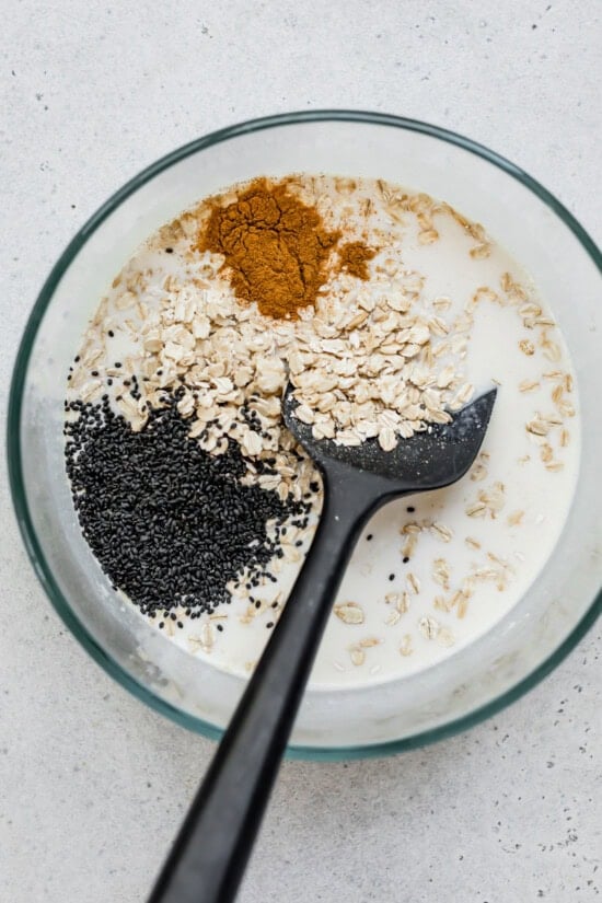 Oats, cinnamon, basil seeds, milks