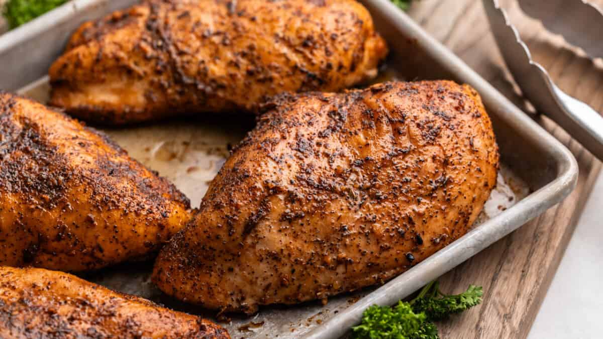 Close up view of smoked chicken breasts.