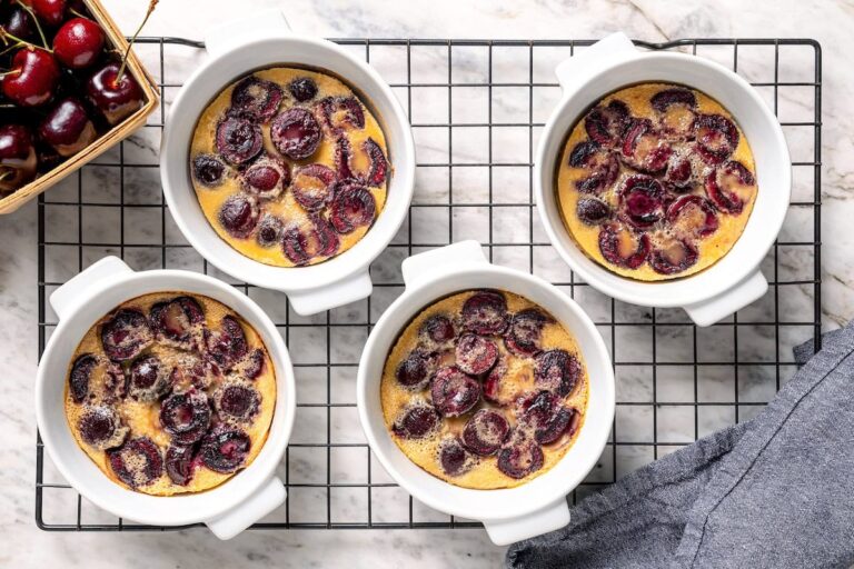 Cherry Clafoutis | Skinnytaste 4 cherry clafoutis on wire cooling rack.