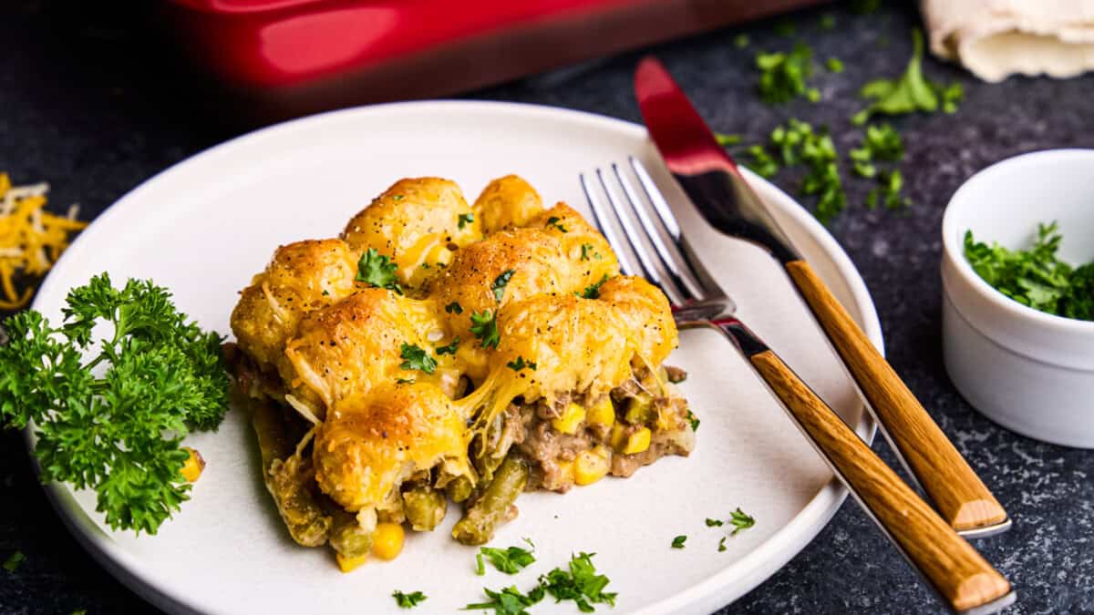 A piece of Tasty Tater Tot Casserole on a plate.