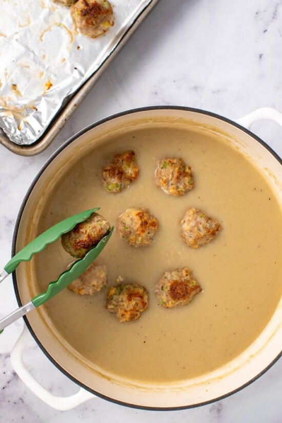 add the meatballs to the gravy