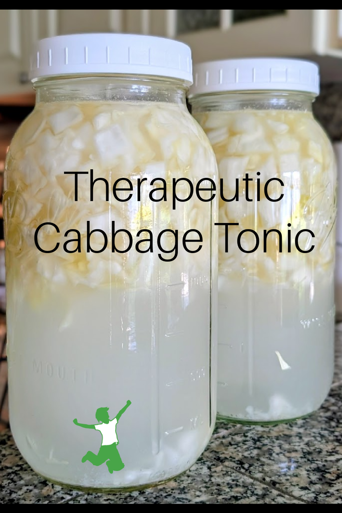 fermented cabbage juice in mason jars